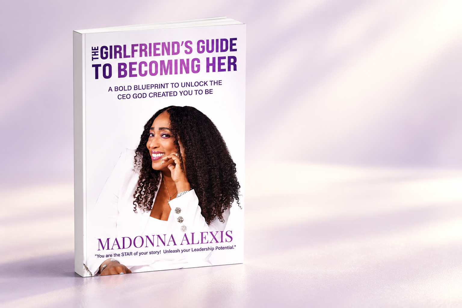 3D presentation of The Girlfriend’s Guide to Becoming HER, featuring its original purple-and-white cover and Madonna Alexis’s portrait.